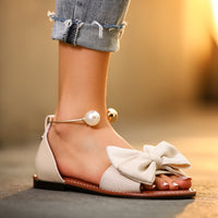 Lunabow Pearl-Cuff Bow Flat Sandals - product image 3
